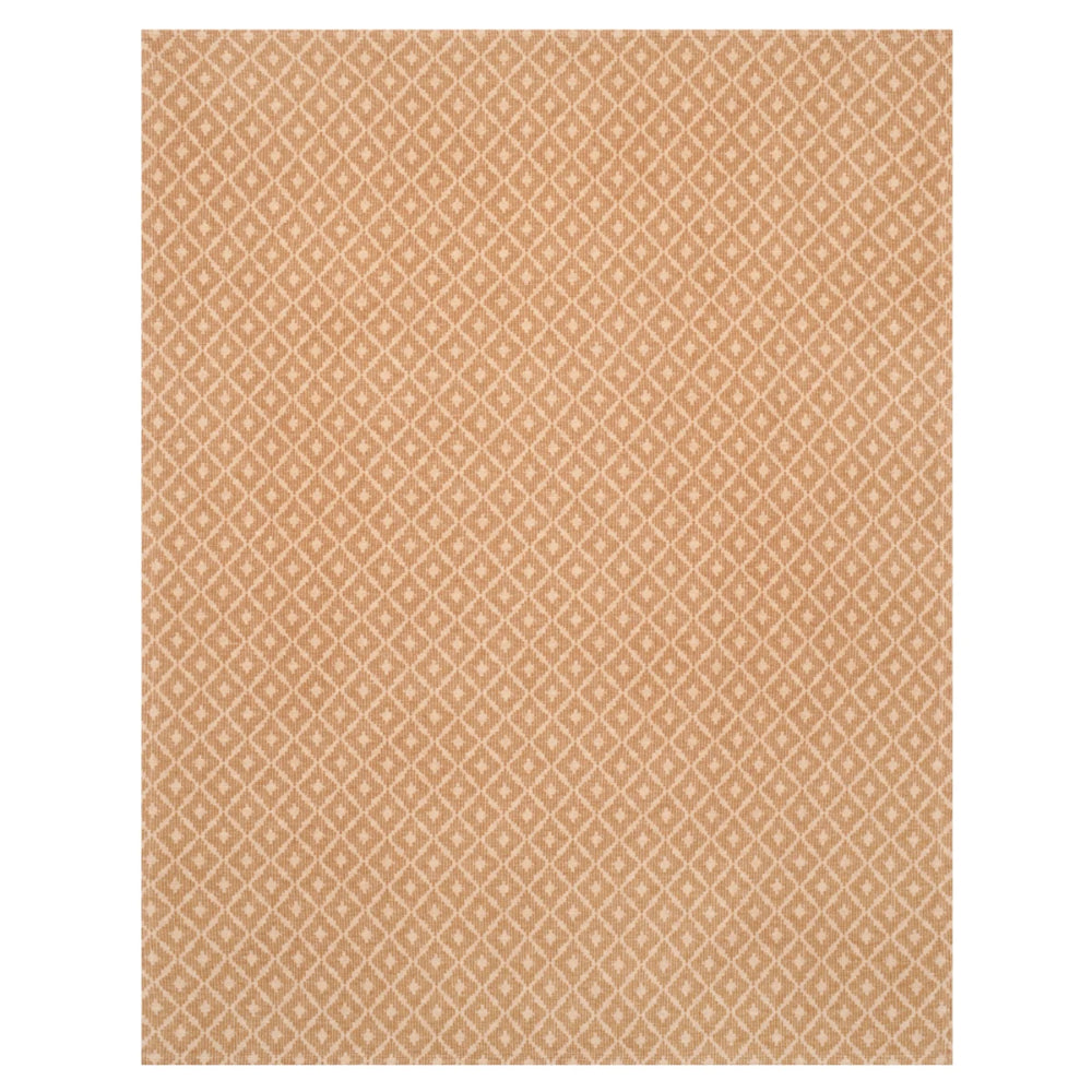 A rectangular area rug with a warm tan and cream geometric diamond pattern, shown flat against a white background.