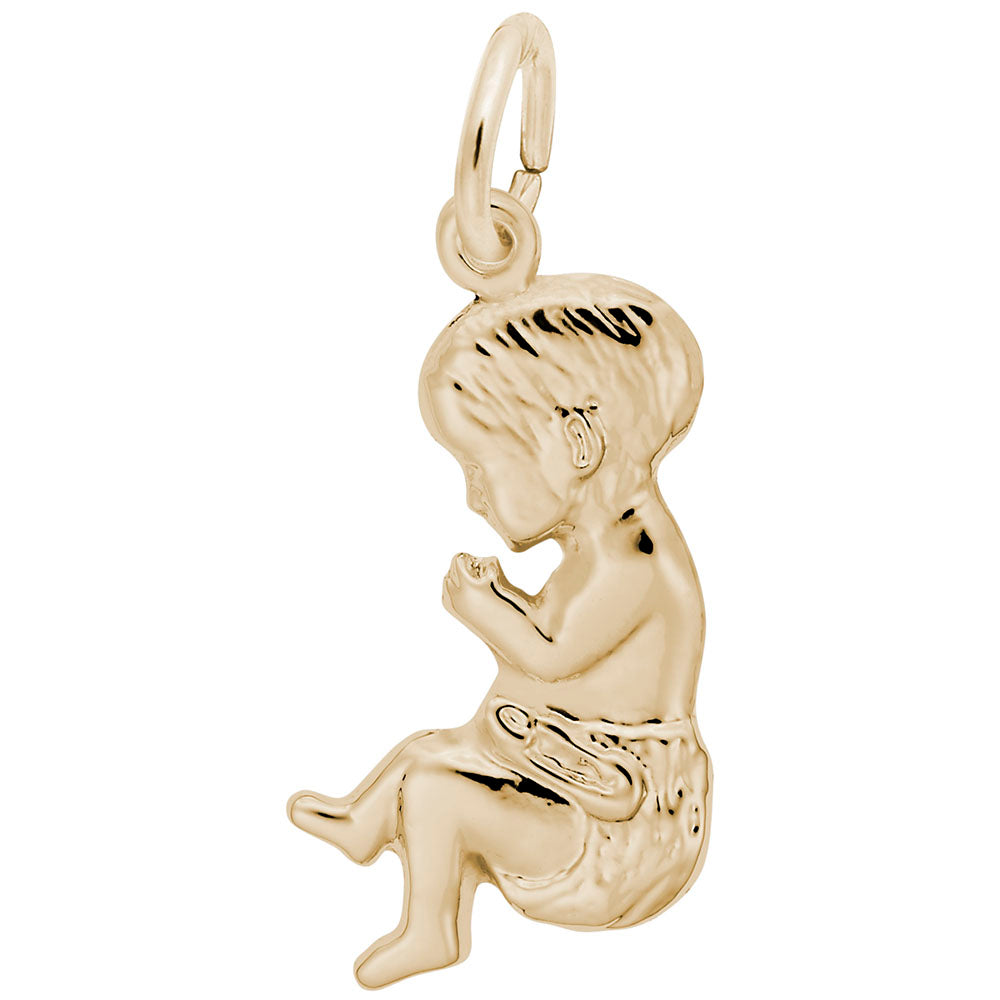 Silver baby charm on a white background