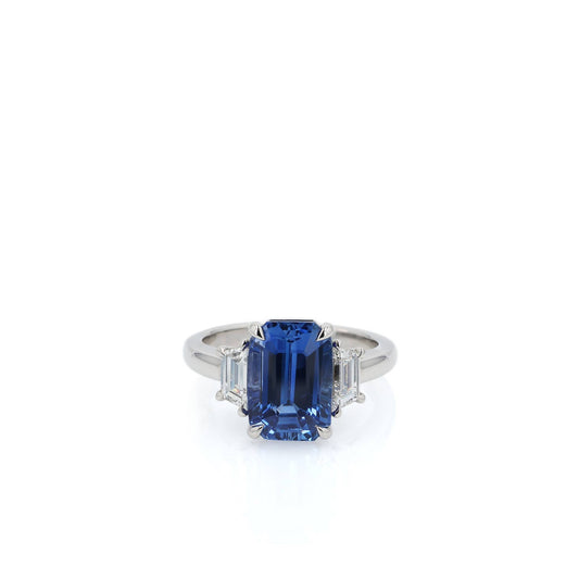 Platinum 5.91ct Emerald Cut Sapphire and Diamond Three Stone Ring