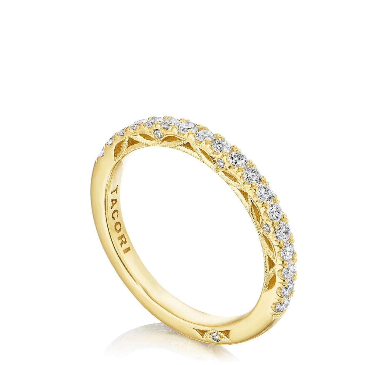 Gold ring with diamonds on a white background
