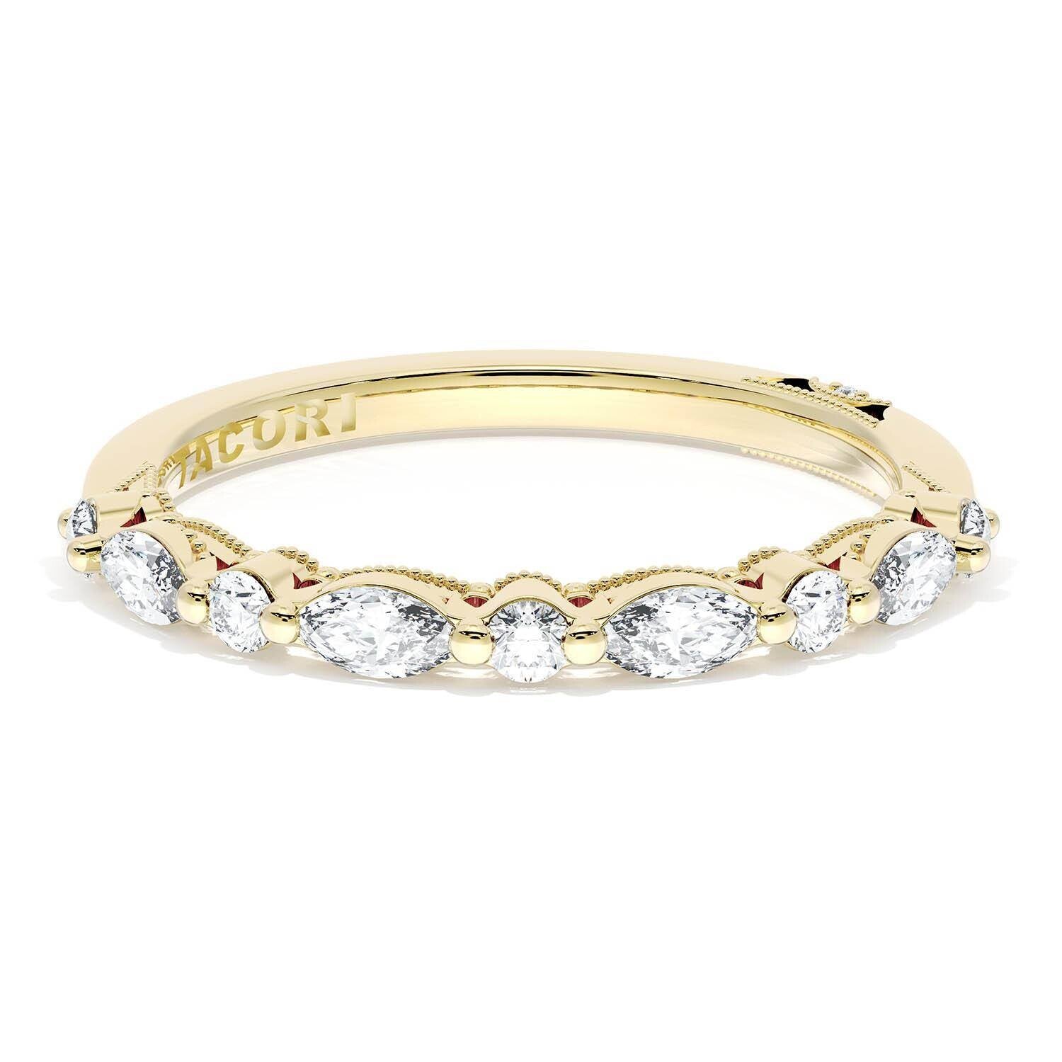 Gold ring with diamonds on a white background
