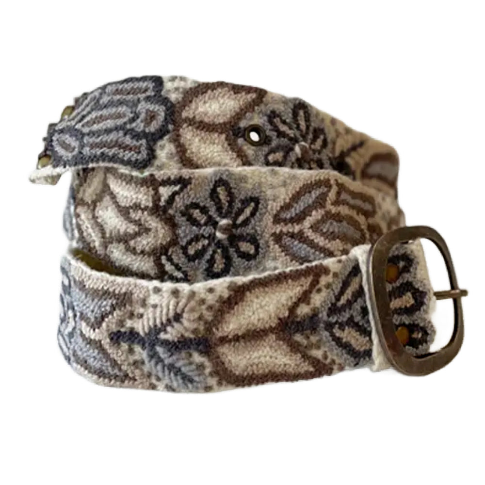 Patterned belt with a brown buckle on a white background