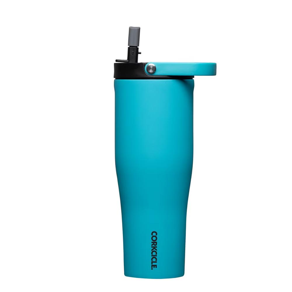 Blue tumbler with black lid on a white background.
