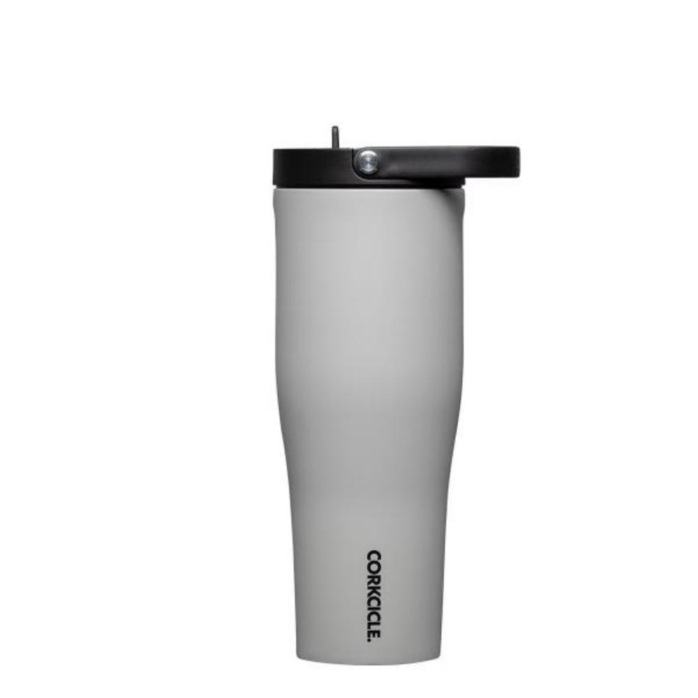 Gray tumbler with black lid on a white background.