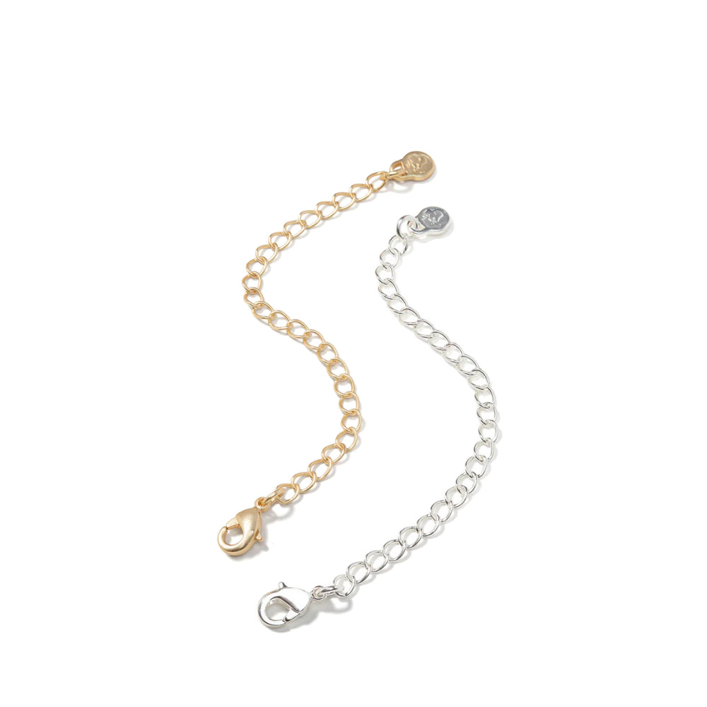 Gold and silver chain extensions on a white background