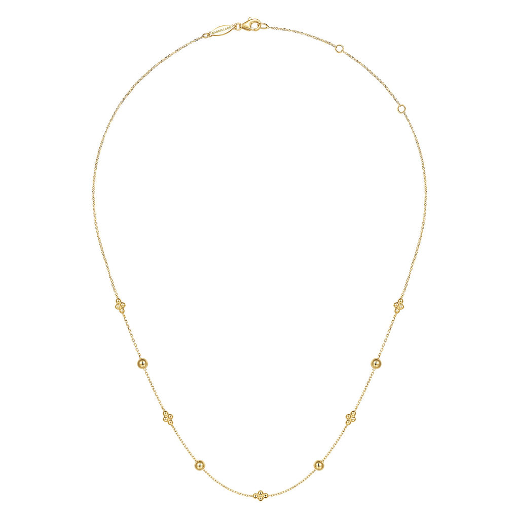 Gold necklace on a white background