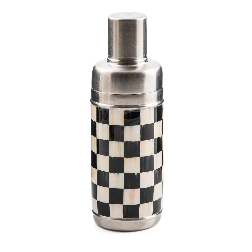 Cocktail shaker with black and white checkered design on a white background