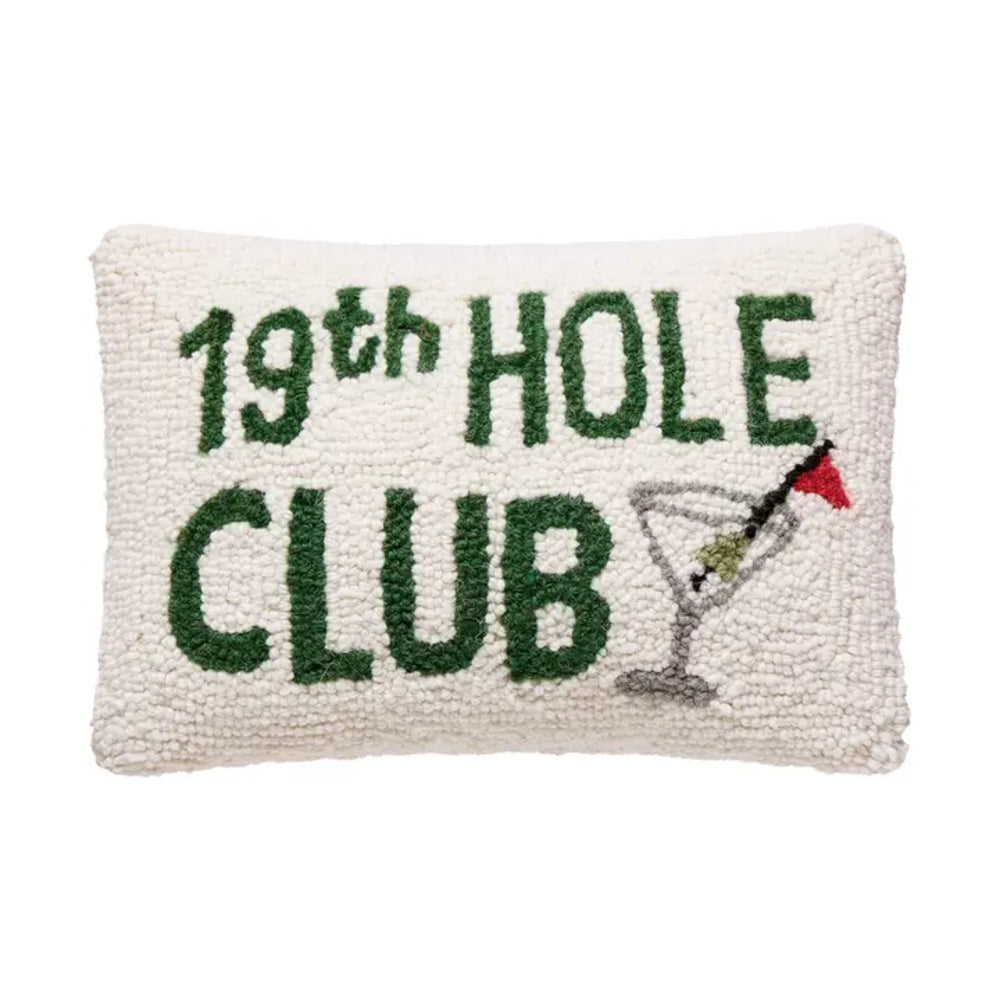 Pillow with '19th Hole Club' text and golf ball design on a white background