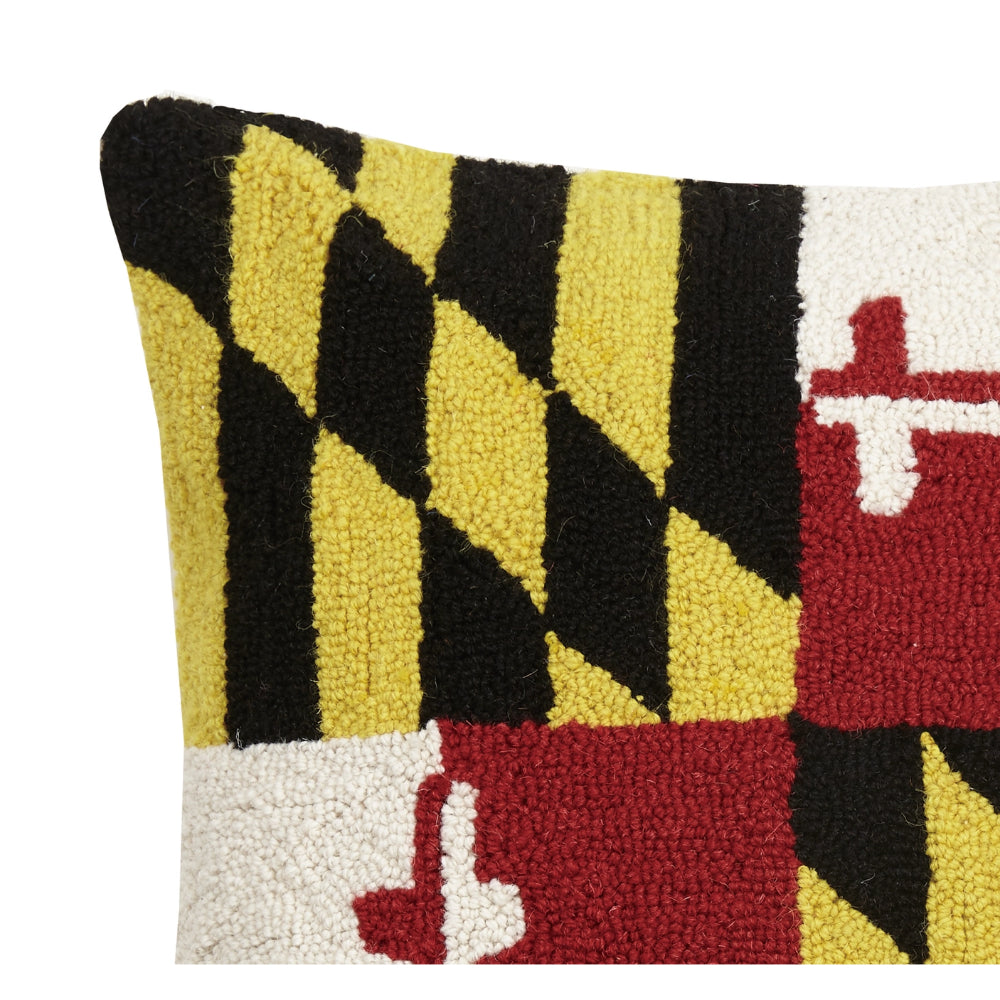 A close up photo of a decorative  maryland flag pillow  on a white background.