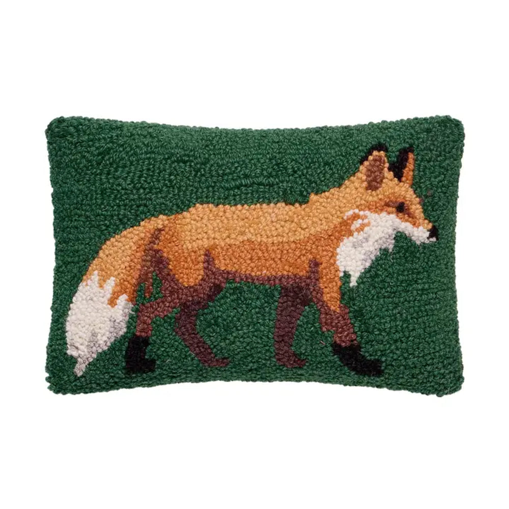 Pillow with a fox design on a green background