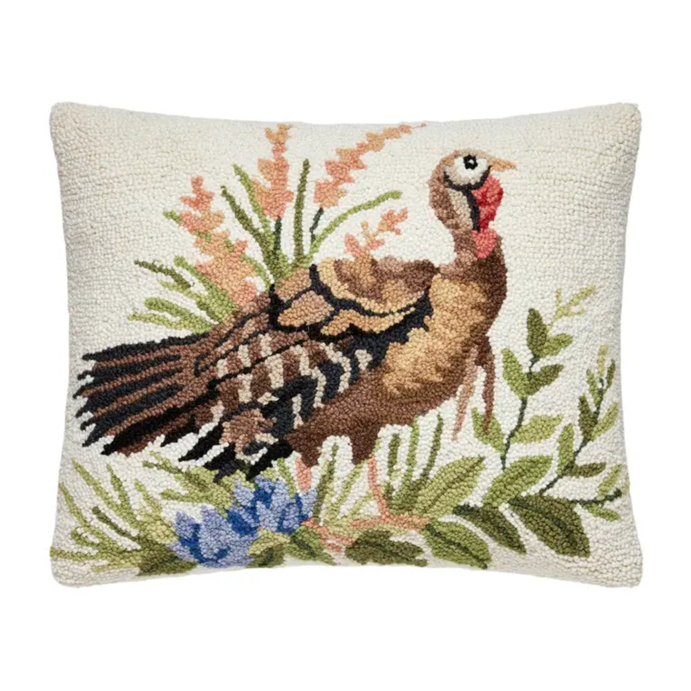 Decorative pillow with a turkey design on a white background