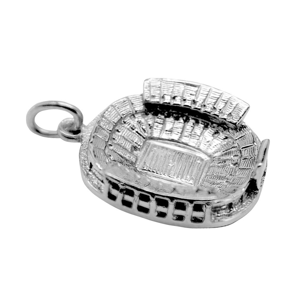 A silver stadium-shaped charm with detailed textured carvings, shown on a plain white background.