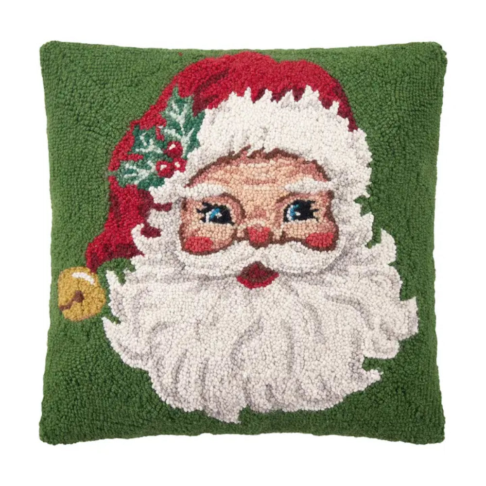 A Santa pillow with Christmas colors on a white background. 
