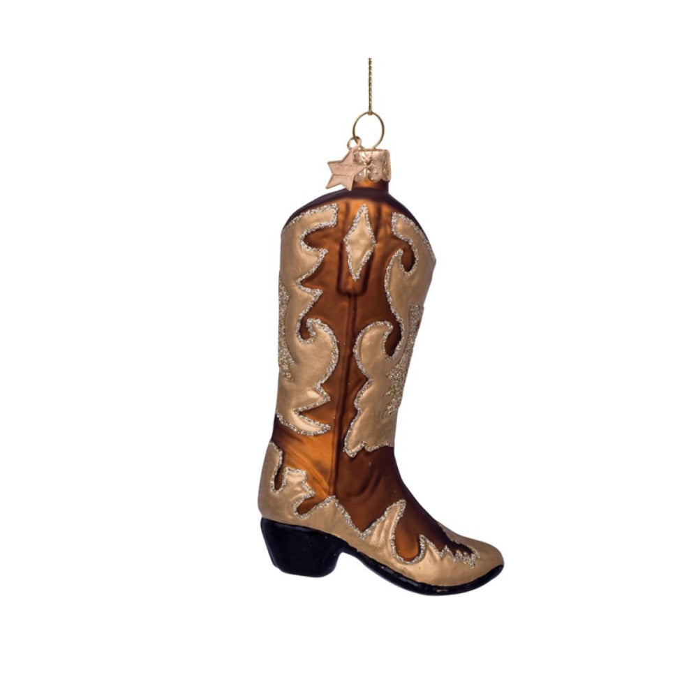 Decorative glass cowboy boot ornament on a white background