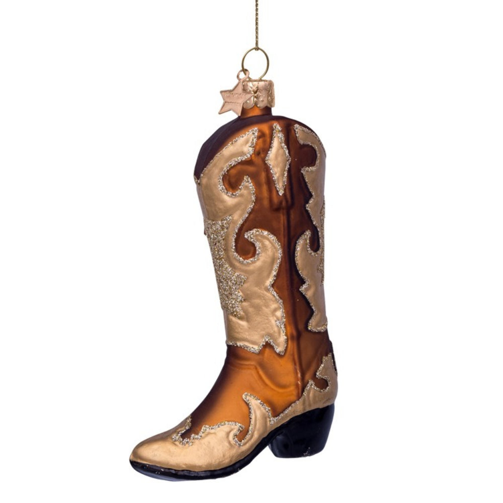 Decorative cowboy boot ornament on a white background