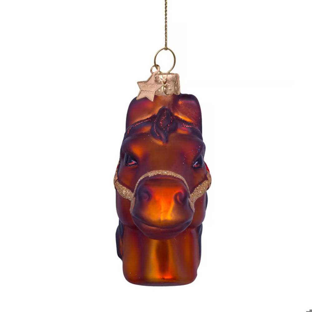 A brown glass horse head Christmas ornament with gold glitter accents on the bridle and a gold hanging loop with a star topper, shown against a plain white background.