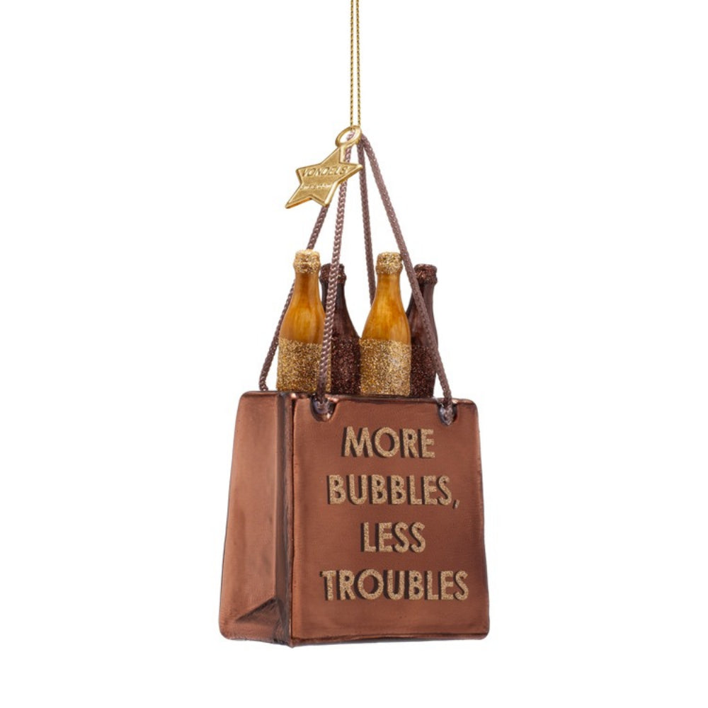 Decorative ornament resembling a shopping bag with bottles labeled 'More Bubbles, Less Troubles' on a white background.