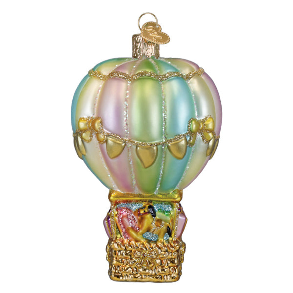 Decorative hot air balloon ornament with pastel colors and gold accents on a white background