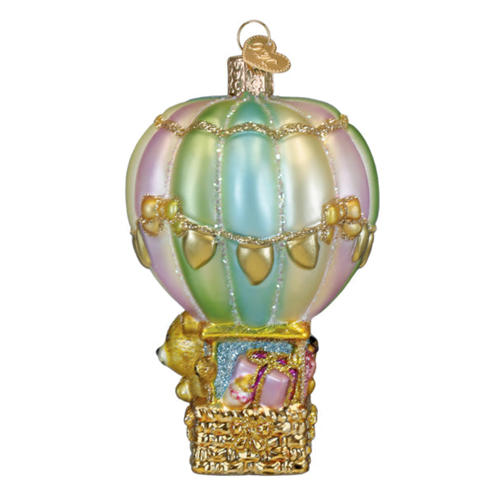 Decorative hot air balloon ornament with pastel colors and a basket on a white background
