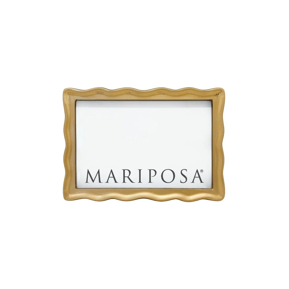 A rectangular picture frame with a wavy scalloped gold border and a white insert displaying the brand name 'MARIPOSA' in black text, shown against a plain white background.