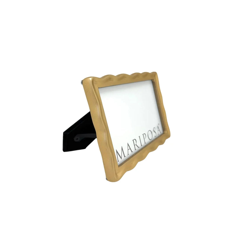 Gold decorative frame with 'Mariposa' branding on a white background
