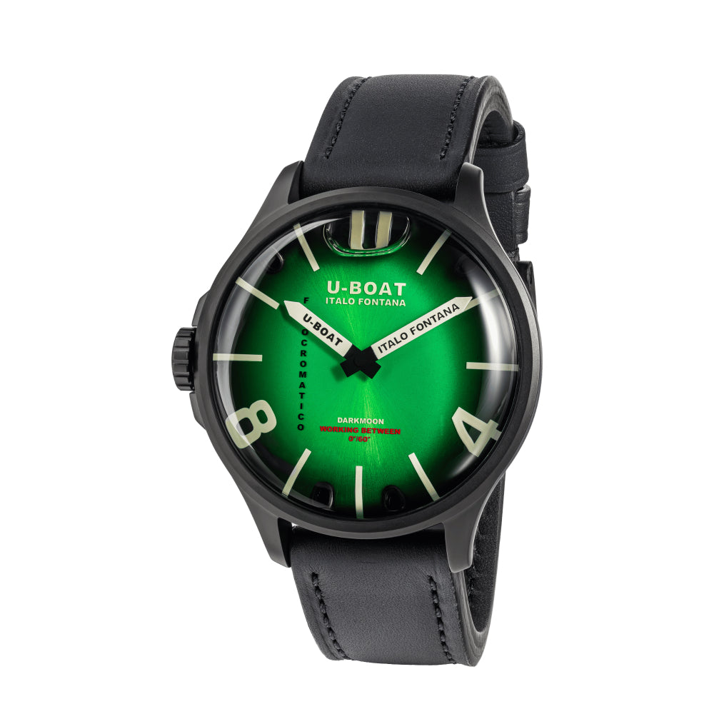 U-Boat watch with green face and black leather strap on a white background