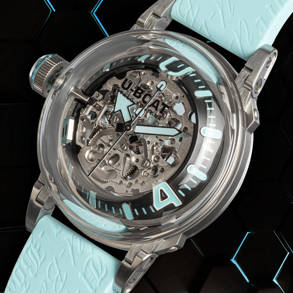Watch with a turquoise strap and transparent case on a black background