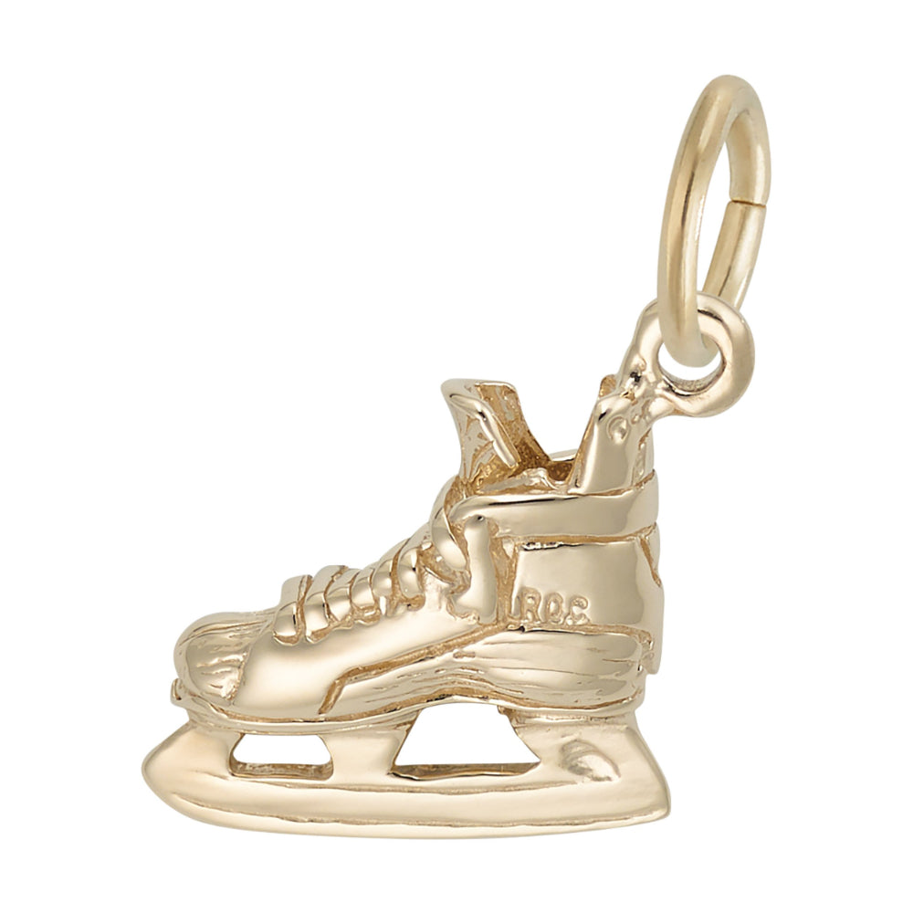 A polished gold ice skate charm with a detailed boot and blade, shown on a plain white background. Facing left