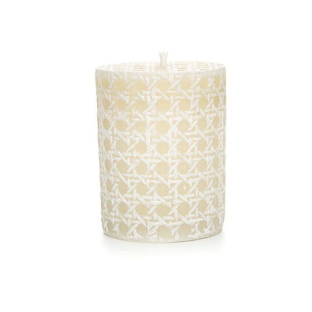 A white 4-inch MacKenzie-Childs Rattan Pillar Candle with a white rattan pattern on a white backround