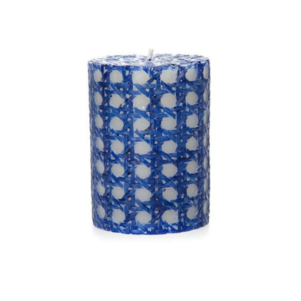 A white 4-inch MacKenzie-Childs Rattan Pillar Candle with a navy blue rattan pattern on a white backround