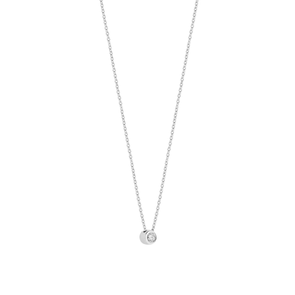 Silver necklace with a small round pendant on a white background