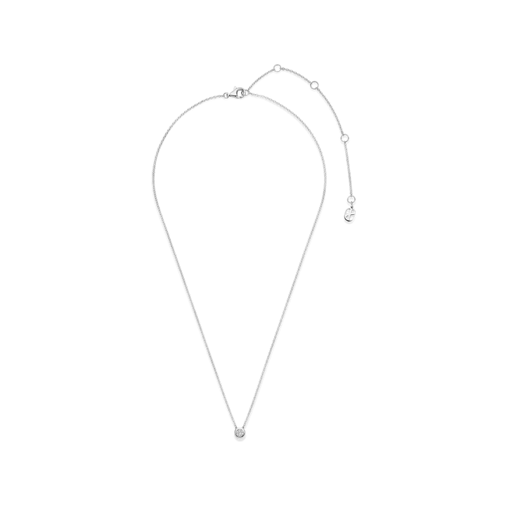 Silver necklace with small round pendant on a white background