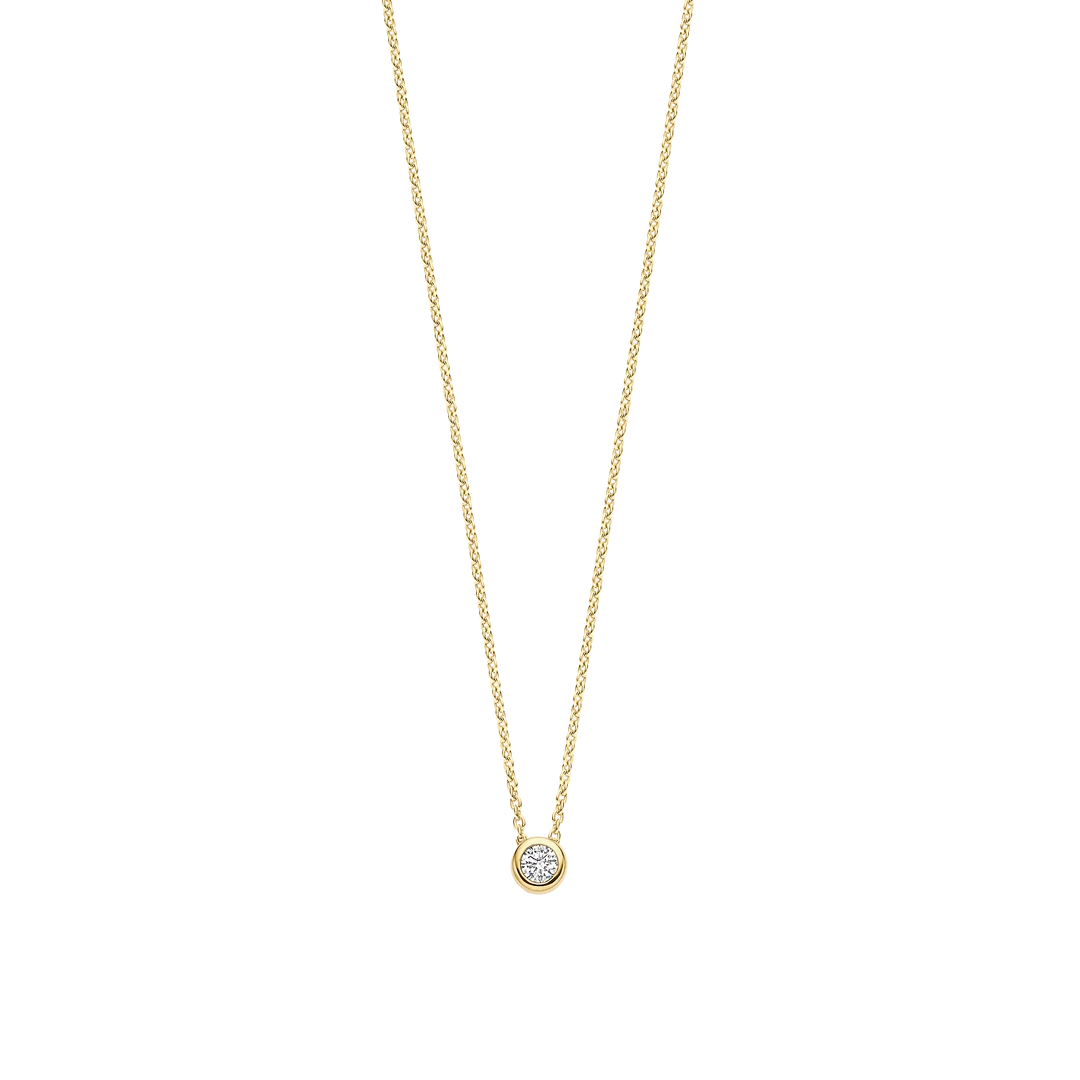 Gold necklace with a small round pendant on a white background
