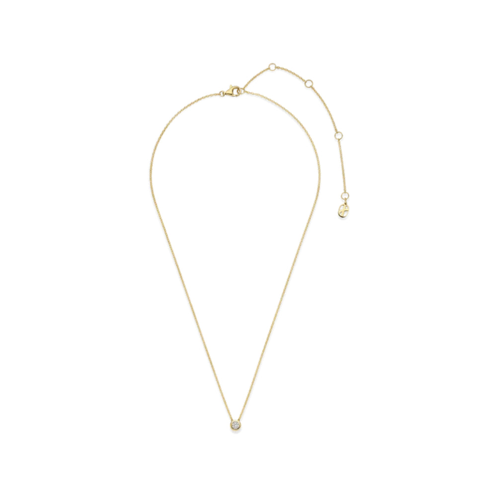 A delicate gold chain necklace with a small, round bezel-set clear gemstone pendant, displayed on a clean white background.