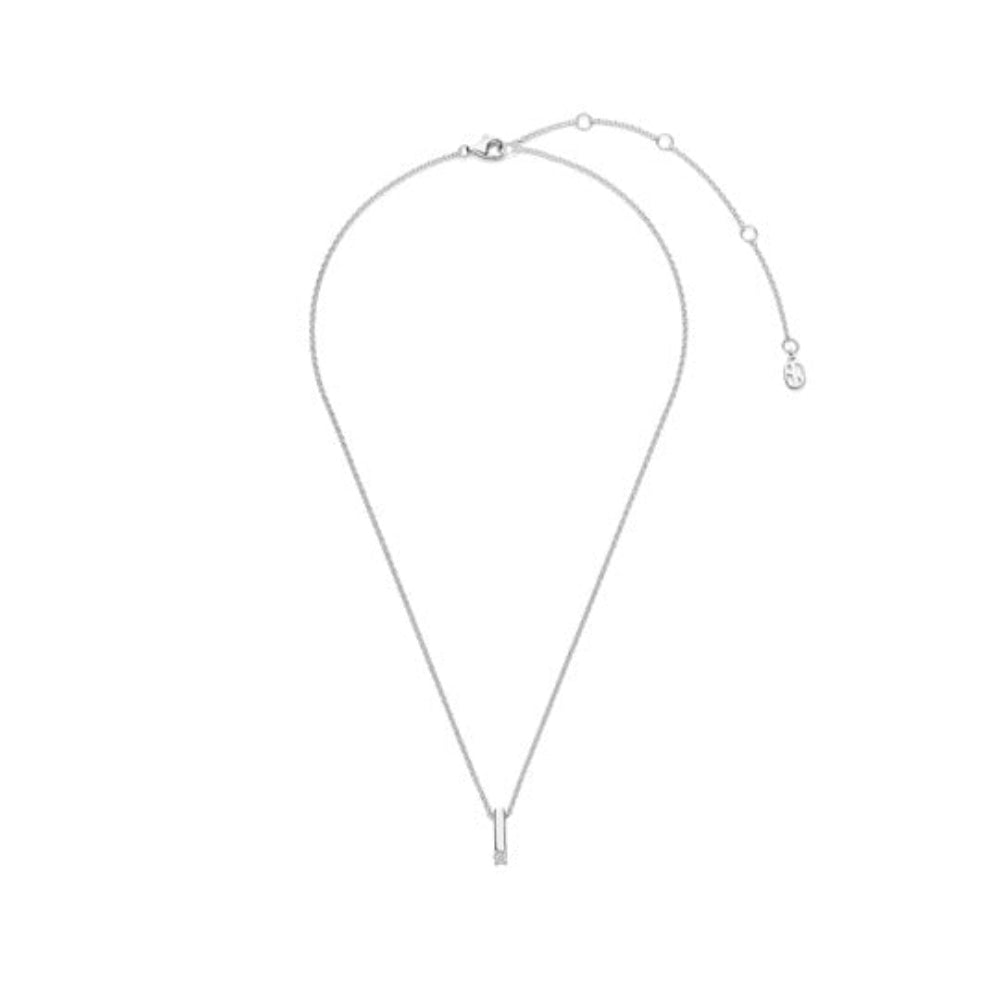 A delicate silver chain necklace with a small geometric pendant at the bottom and an adjustable extender chain with circular links, shown on a plain white background.