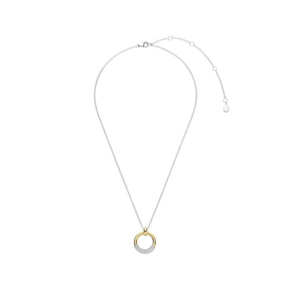 A delicate silver chain necklace with a circular pendant featuring a gold accent and a row of small clear stones, displayed on a clean white background.