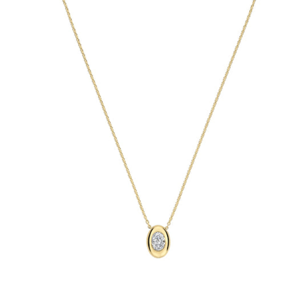 A delicate yellow gold chain necklace with an oval pendant featuring a small marquise-cut clear gemstone, set against a solid white background.