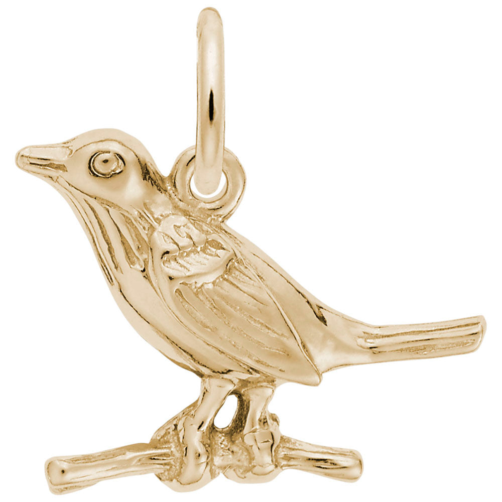 Gold bird on a branch charm on a white background