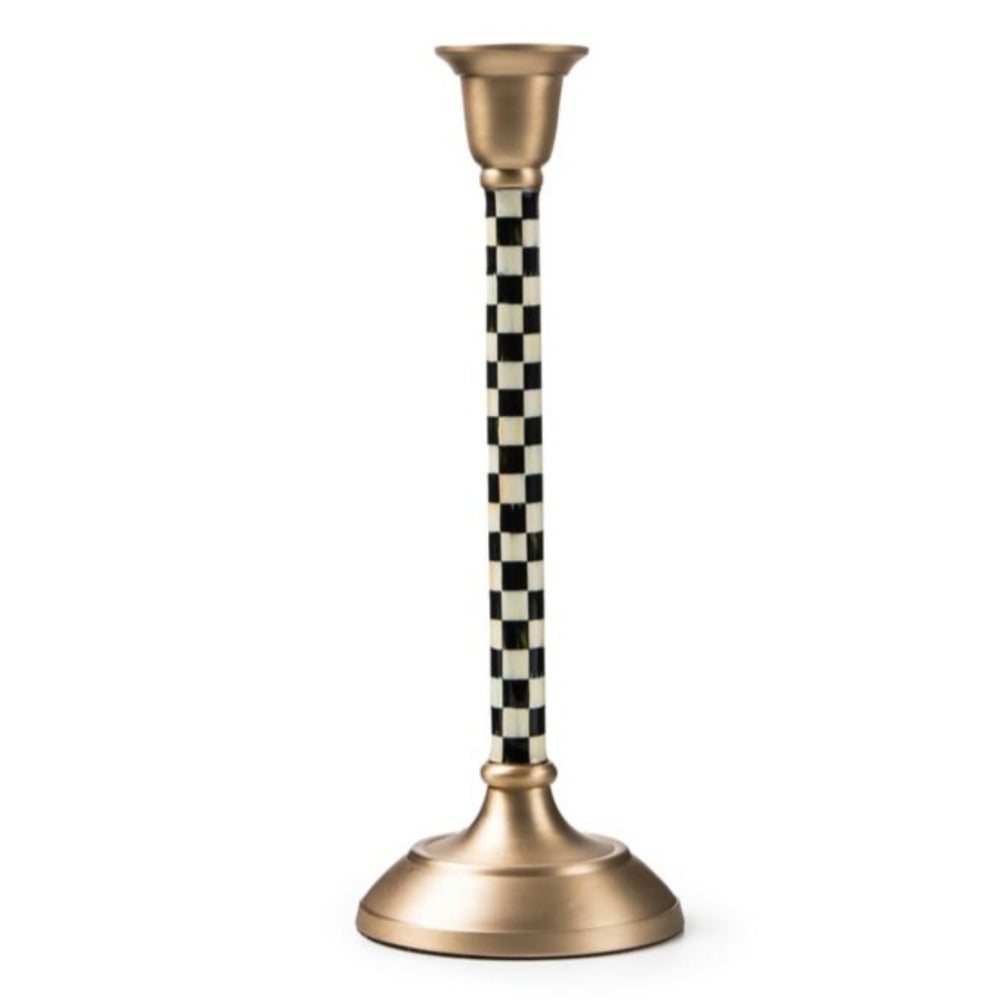 A medium size decorative candle holder with checkered design and gold base on a white background