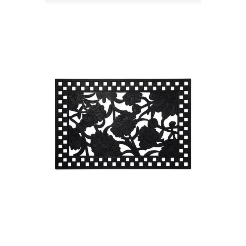 A black rubber door mat with a floral daisy design.