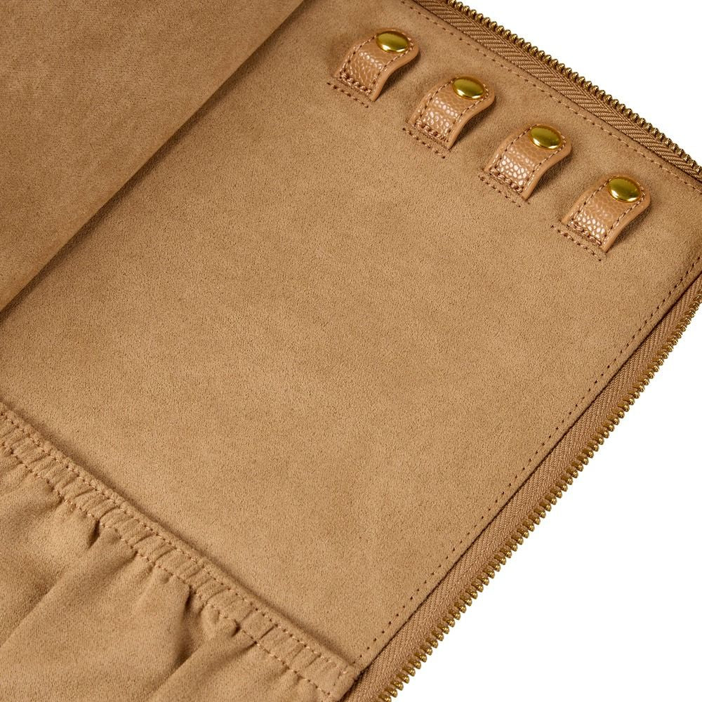 Close-up of a tan suede or suede-like pouch or organizer interior with a zipper edge, stitched seam, and four gold-tone snap loops with round gold snaps on a white background.