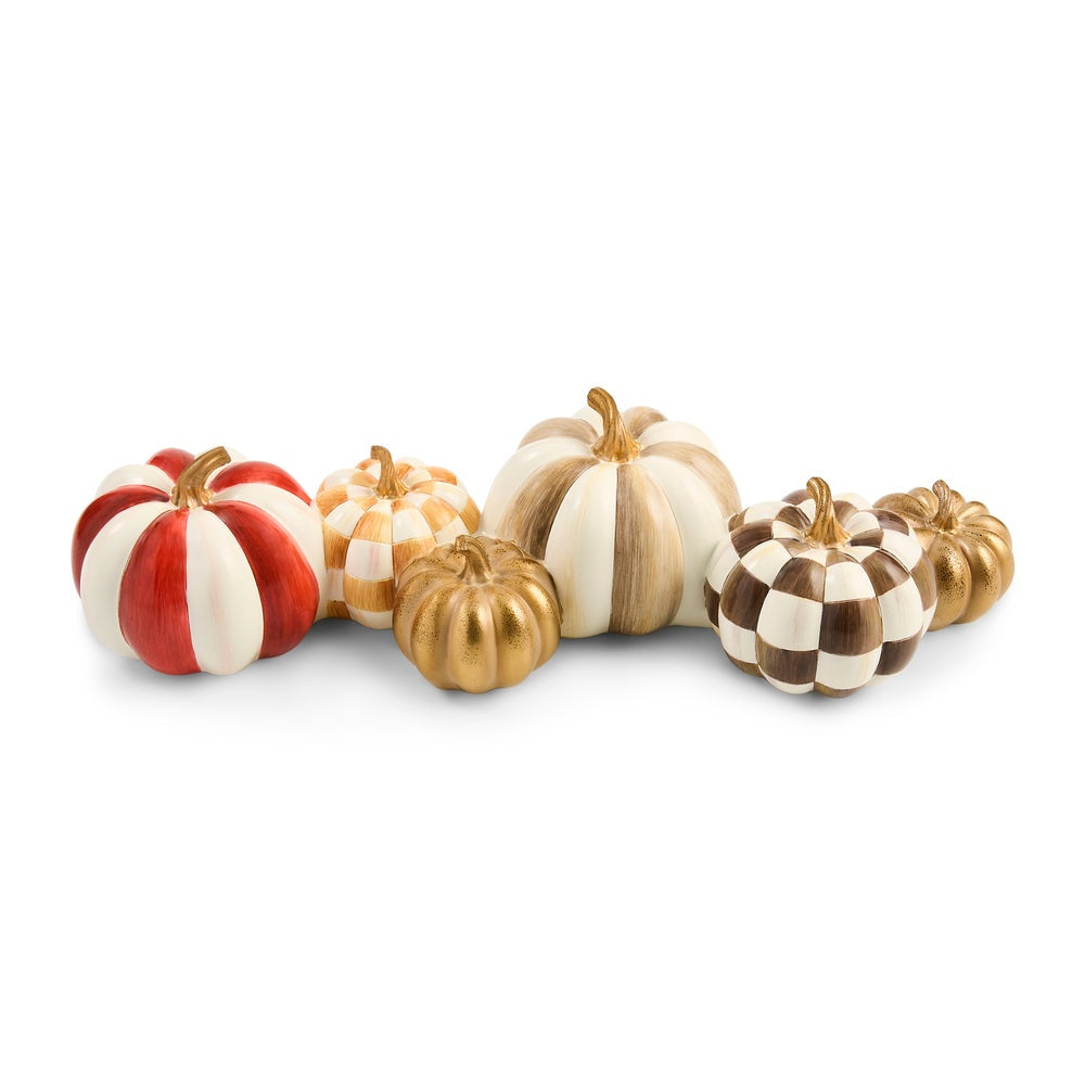 A set of decorative pumpkins in various patterns including red and white stripes, gold and white stripes, solid gold, and brown and white checkered, arranged on a white background.