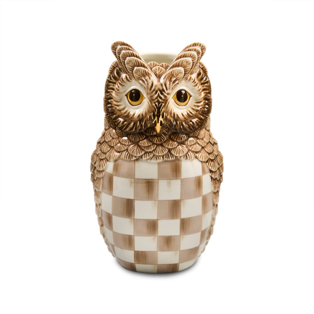 An owl-shaped ceramic planter with a brown and cream checkered body, detailed brown feathers on its head and chest, and large yellow eyes, shown on a plain white background.