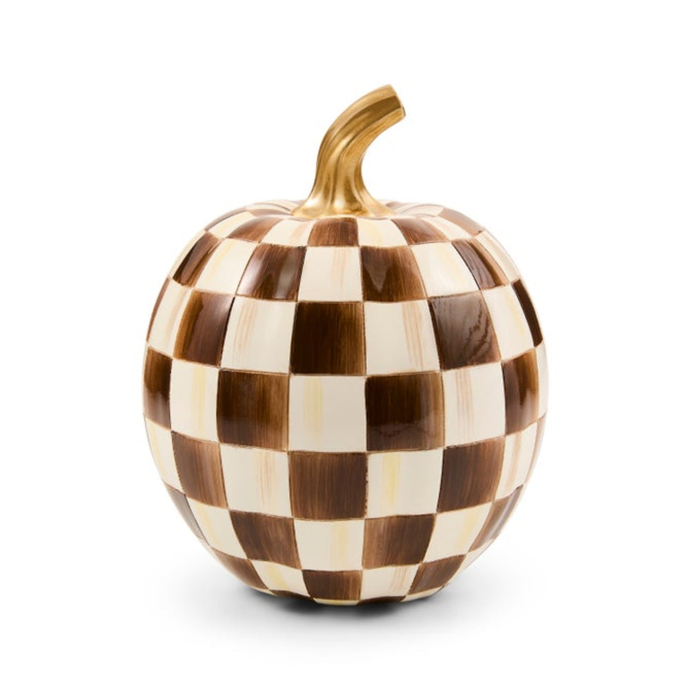 A decorative pumpkin-shaped object with a brown and cream checkerboard pattern and a curved gold stem, shown on a clean white background.