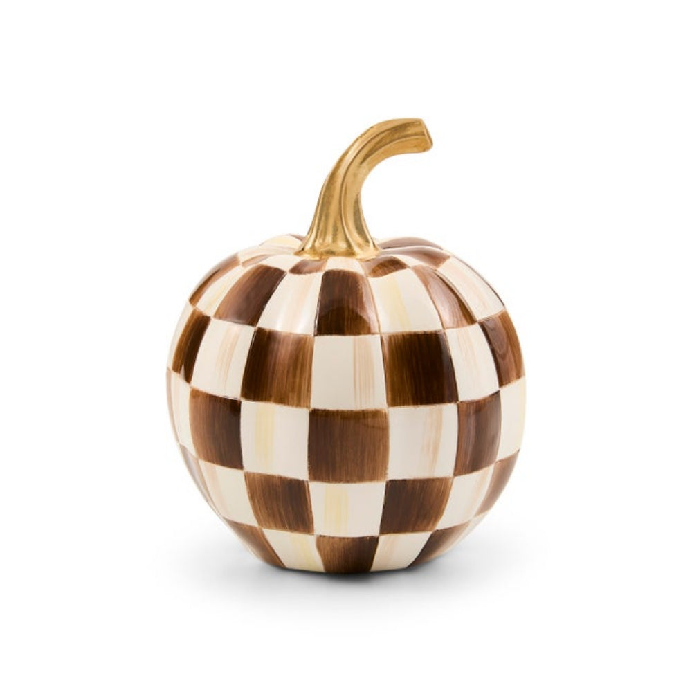 A decorative pumpkin figurine featuring a brown and cream checkerboard pattern with a metallic gold stem, set against a plain white background.