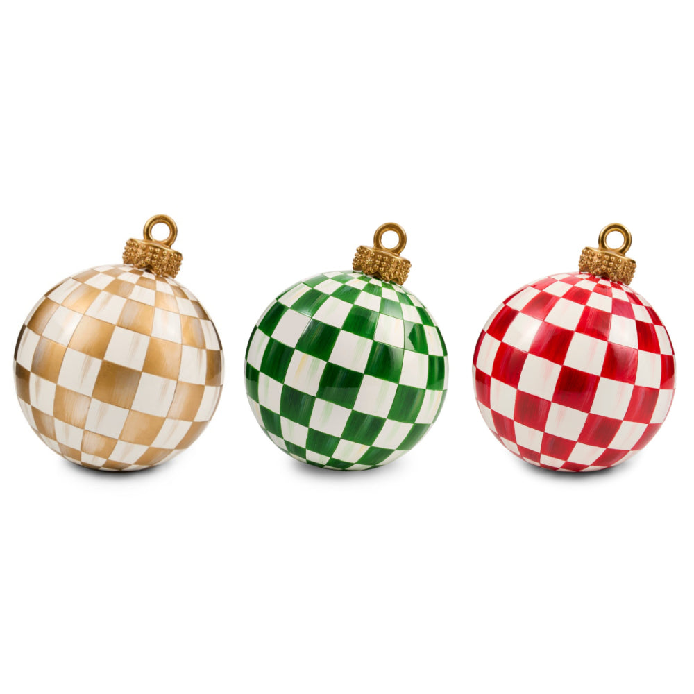 Three checkered Christmas ornaments in gold-and-white, green-and-white, and red-and-white patterns, each with a gold hanging loop, shown on a plain white background.
