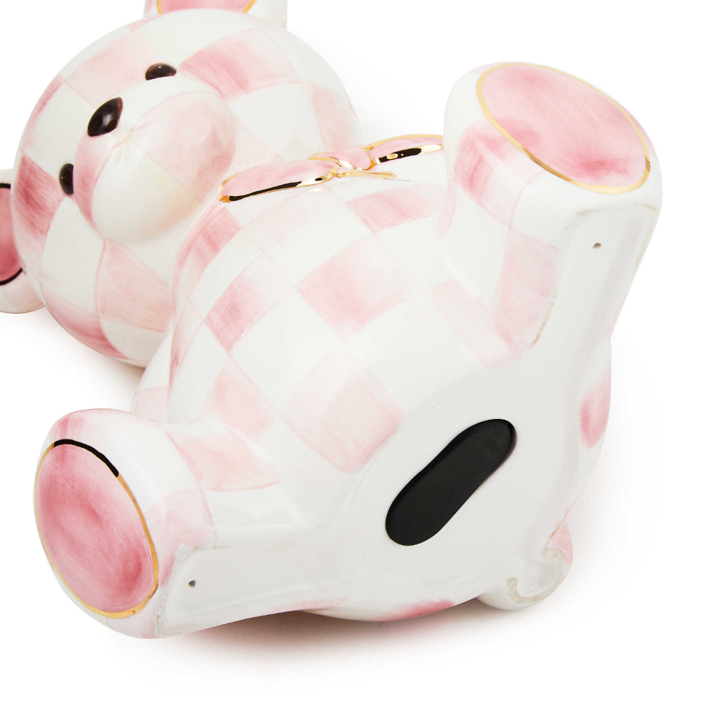 Bottom view of Rosy Bear Bank, pink pattern, gold trim/edges on a white backround. 