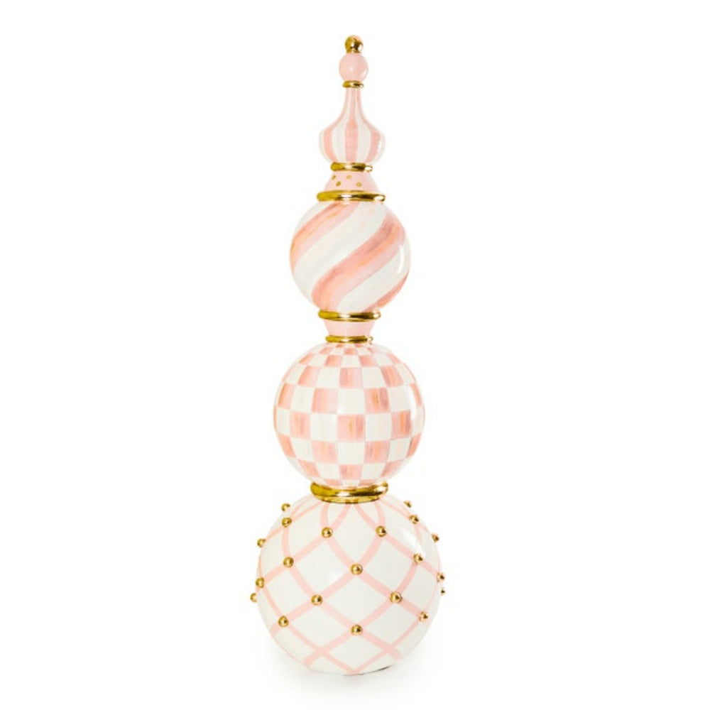 Decorative bottle with pink and white checkered pattern on a white background