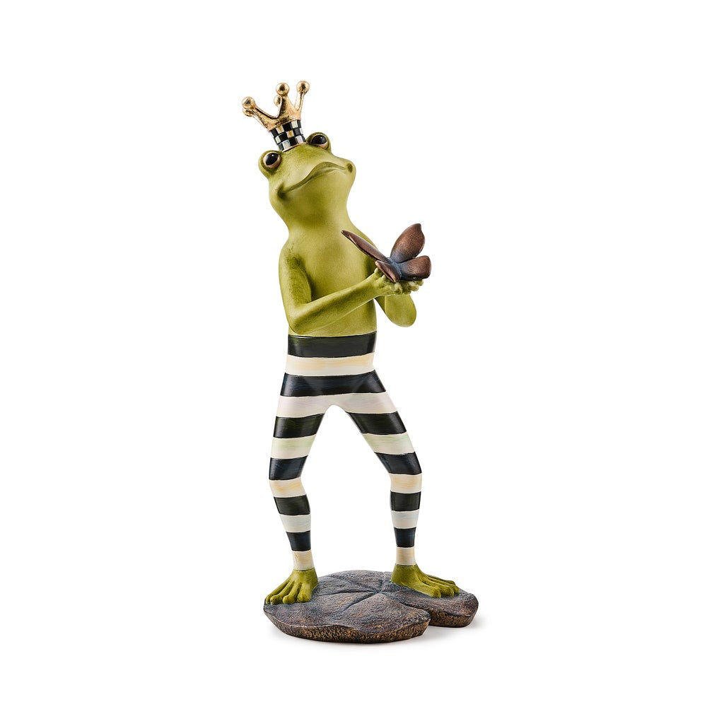 Frog figurine with a crown and striped pants holding a butterfly on a white background.