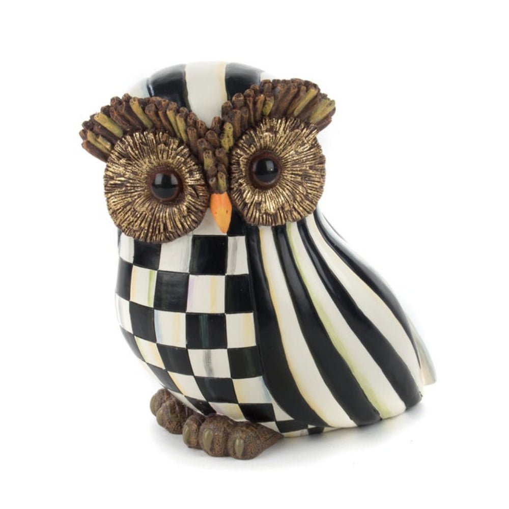 Decorative owl figurine with black and white checkered pattern on a white background
